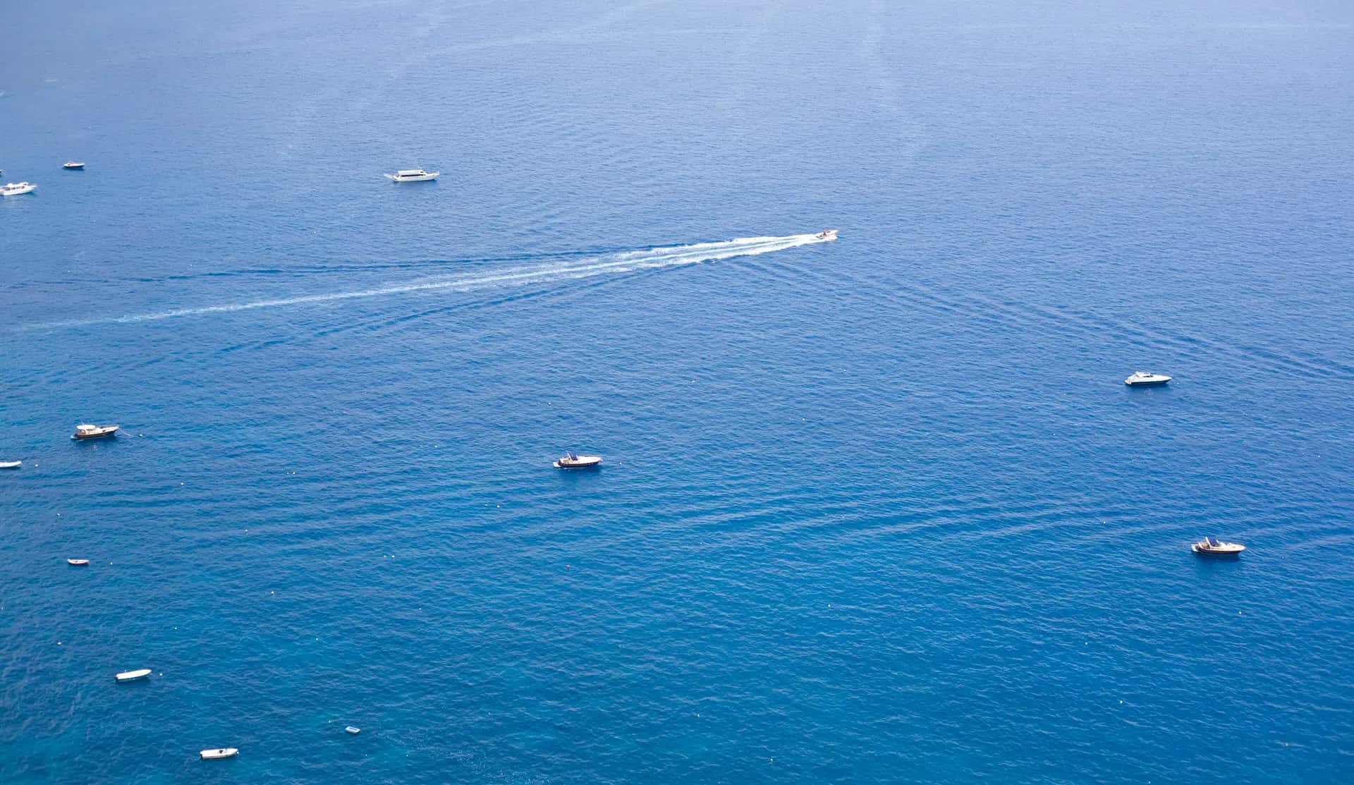 The Amalfi Coast falling away into the sea, seen from the cliffs above Positano